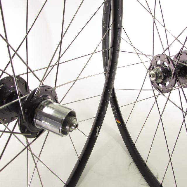 Custom wheel: Chris King R45 Disc Gray hubs, HED Plus 25 Black rims, Sapim Race Silver spokes