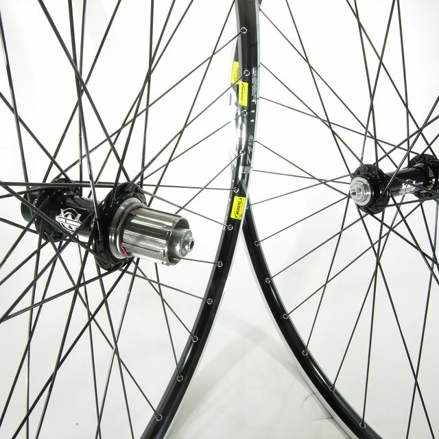 Custom wheel: White Industries T11 Black hubs, Mavic A719 Black rims,